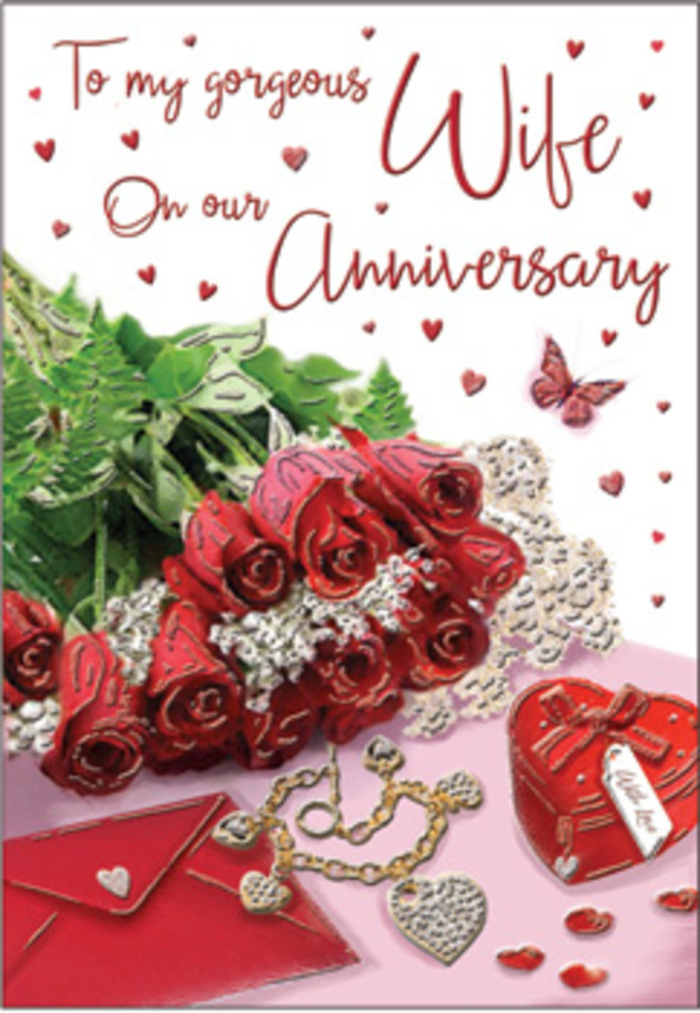 The image portrays an anniversary card styled with the kind of attention to detail you might expect from an experienced Greenwich florist. At centre stage, a handful of red roses is arranged as though they have just been set down from a bouquet, the blooms full and open, with velvety petals that overlap in generous, spiralling layers. The colour of the roses is a rich, classic crimson, evoking passion and enduring affection. Nestled around them is a border of lush greenery, leaves smooth and softly curved, their deep green hue enhancing the drama of the red petals. Adjacent to the floral focal point lies a softly tinted envelope, perhaps cream or blush, placed with its flap closed but suggesting a personalised message hidden inside, like a love letter written in a café near Greenwich Market. Close by, a glossy red heart-shaped box rests on the surface, its rounded form and bright colour conjuring the idea of cherished tokens kept safe over the years. A slender piece of jewellery-likely a necklace-sits alongside, crafted in warm golden metal and formed into delicate, intertwined heart motifs that shimmer gently. Scattered across the card's surface are small heart icons and sparkling adornments that catch the light without overwhelming the design. A single butterfly illustration appears to flutter near the roses, adding a subtle note of whimsy and renewal. The lighting is soft and even, casting minimal shadows so that every detail remains clear yet gentle. Overall, the composition conveys warmth, gratitude, and romance, perfectly suited to mark an anniversary shared in the historic charm of Greenwich.